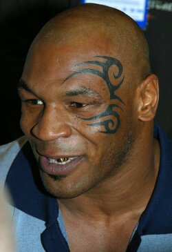 mike-tyson-face-tattoo-meaning-64e347a2a948a.jpg