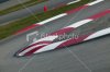 stock-photo-9015239-race-track-turns-and-curbs.jpg
