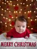 baby_with_xmas_lights_on_wall-tjm01-ps01a-01.jpg