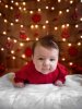 baby_with_xmas_lights_on_wall-tjm01-ps01a-02_no_crop-no_text.jpg
