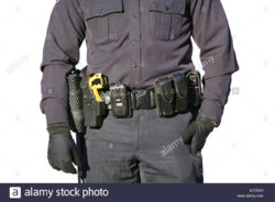 police-officer-in-black-uniform-wearing-equipment-belt-isolated-on-AJTAGH.jpg