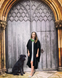 Girl with black dog.jpg